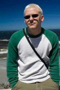 Young man at the beach Stock Photos