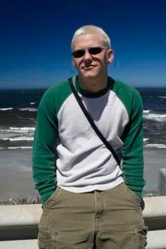 Young man at the beach 写真素材