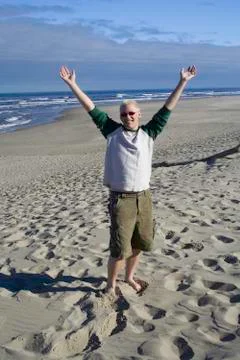 Young man at the beach Stock Photos