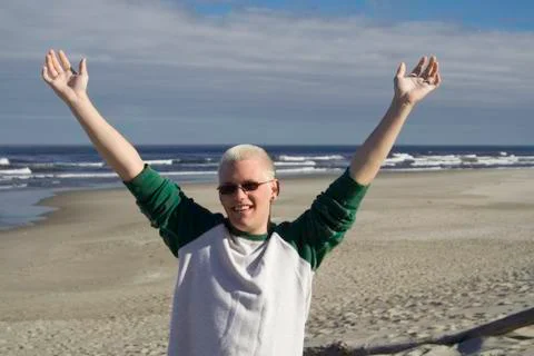 Young man at the beach Stock Photos