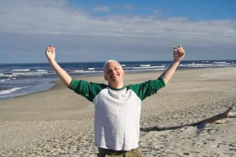 Young man at the beach Foto stock