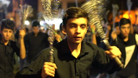 Young man beating himself during Muharram, in Iran, 4K, DNxHR 스톡 동영상 150167227