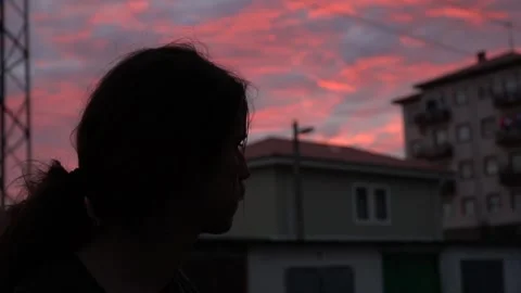 Young man with a beautiful sunset Stock Footage 256086000