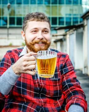 Young Man With A Beer Stock Photos