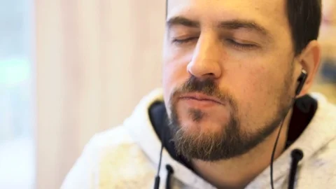 Young man bites a delicious burger. Stock Footage 83701062