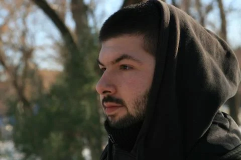 Young Man With A Black Beard Thinking 스톡 사진