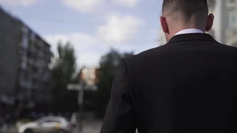 Young man in black classic jacket 库存影片 334721099