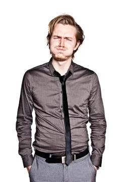 Young man is blowing cheeks Stock Photos