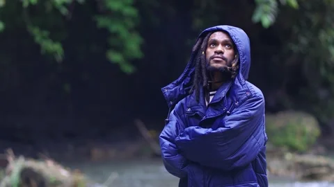 Young Man With Blue Jacket Feeling Cold While Looking Around Stock Footage 208909887
