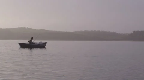 Young man on a boat Stock Footage 62757606