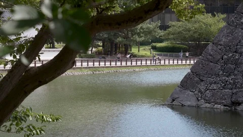Young Man Break Dances in Front of Kokura Castle Vídeos de archivo 95742004