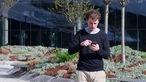 Young man browsing movile Stock Footage 149822257
