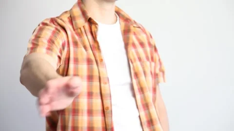 Young man brushing off somebody Stock Footage 60408187