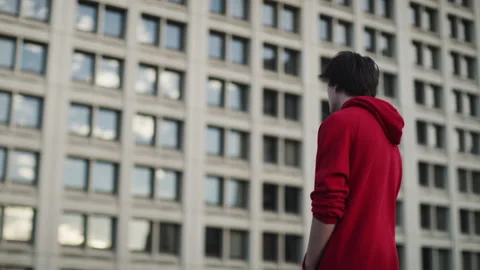 Young Man on a Building and Windows In the background Stock Footage 264192950