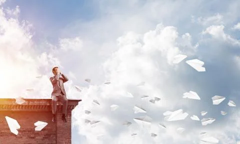 Young man on building edge do not want to see anything Stock Photos