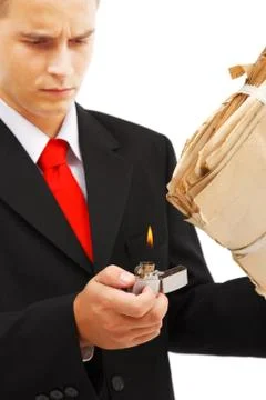 Young man burning file folder Stock Photos