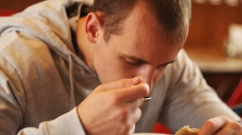 A young man is in the cafe lunch Video stock 68207608