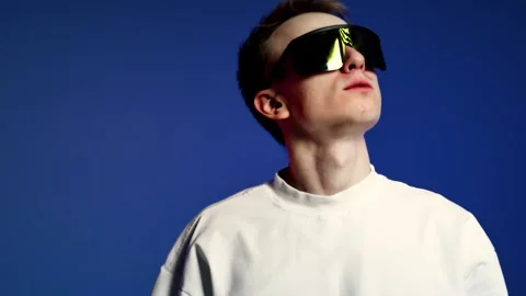 Young Man in Calm Studio Performance Pose Stock Footage 345602603