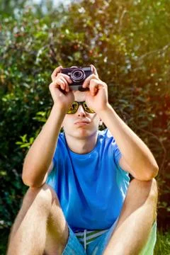 Young Man with a Camera Foto stock