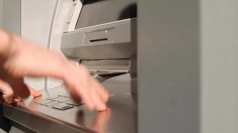 Young man can't remember credit card password at bank counter Stock Footage 92217666