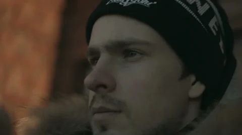 Young man in a cap. The face close up. Winter Video stock 58517270