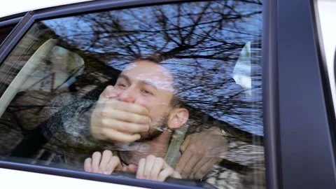 A young man in captivity from terrorists. Violence and abduction 動画素材 85908539