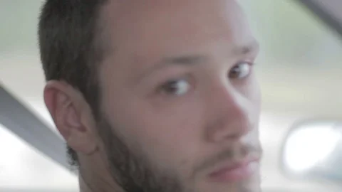 Young Man In Car, Look at Camera Stock Footage 70266879