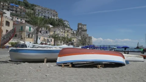 Young man carrying windsurf board Stock Footage 90058337