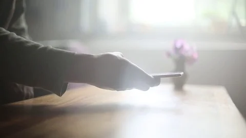 Young Man Casually Using Smartphone in Natural Lighting Video stock 78206253