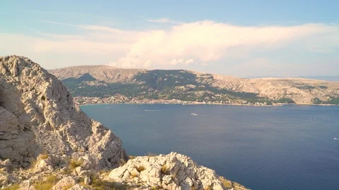 Young man celebrating at a mountain summit, Croatia. Stock Footage 118089155