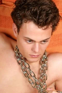 Young man with chain Stock Photos