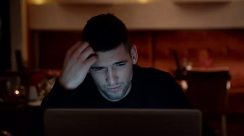 Young man chatting on the computer Stock Footage 61289763