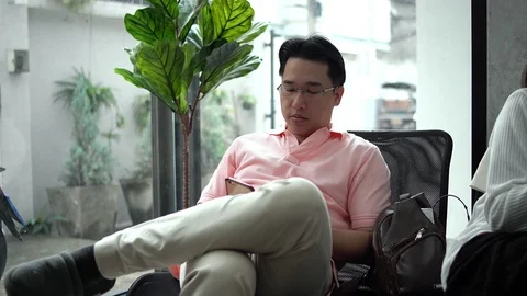 The young man chatting on smartphone Stock Footage 101864737