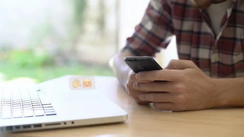 Young man chatting on smartphone Stock Footage 106293877