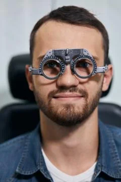 Young man checking his eyesight Stock Photos