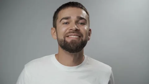 Young man checking his teeth health condition Stock Footage 233516232
