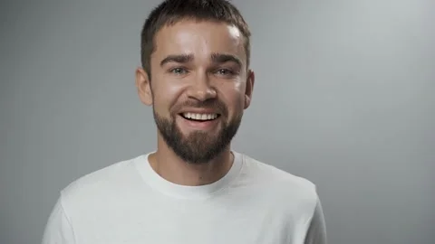 Young man checking his teeth health condition Stock Footage 233516974