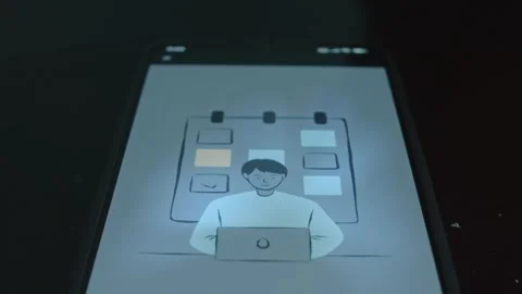 Young man checks off the list of work done at computer, presentation Stock Footage 309457919