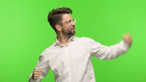 Young man on chroma who does not surrender Stock Footage 97589649