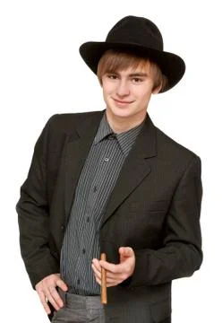 Young man with cigar in hat Stock Photos