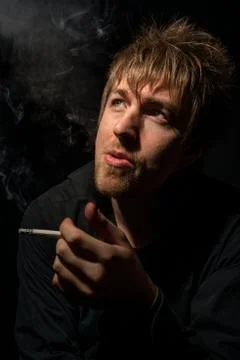 Young man with Cigarette Stock Photos