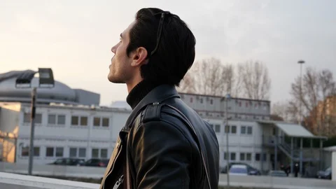 Young man in city, walking Stock Footage 96028093