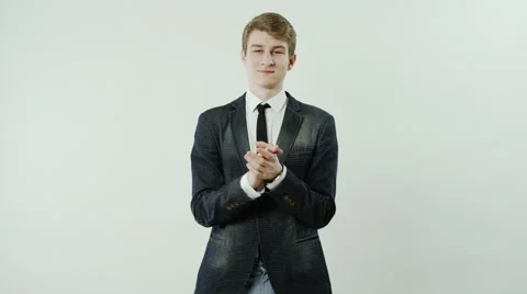 Young man is clapping Stock Footage 62911264