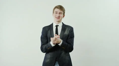 Young man is clapping Stock Footage 62911867
