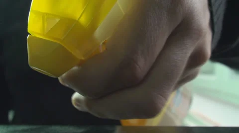 Young Man Cleaning A Shelf Front-Shot Stock Footage 34045310