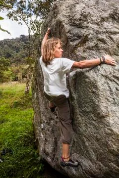 Young man climbing Stock Photos