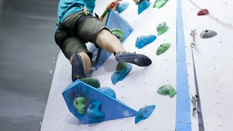Young Man Climbing A Rock Wall Stock Footage 236309722