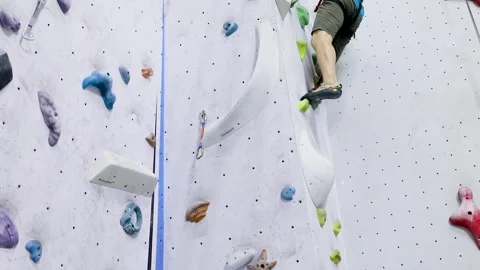 Young Man Climbing A Rock Wall Stock Footage 237215946