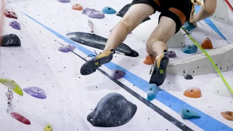 Young Man Climbing A Rock Wall Stock Footage 237215965