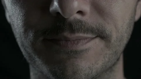 Young man close up shot of lips with brace. Dental, orthodontic concept brace Video stock 134542735
